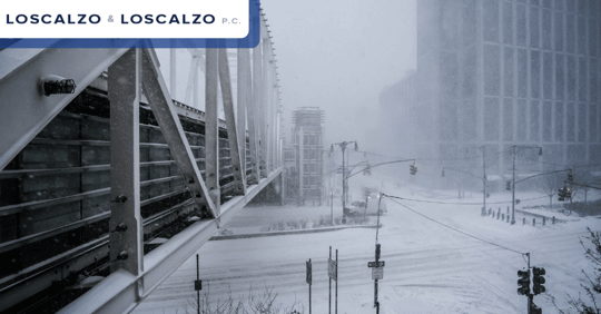 Snowy road and bridge in NYC