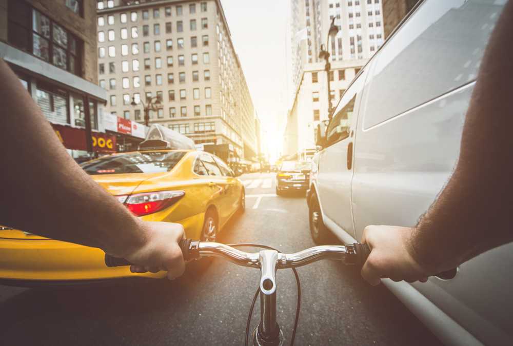 Biking through city first person point of view